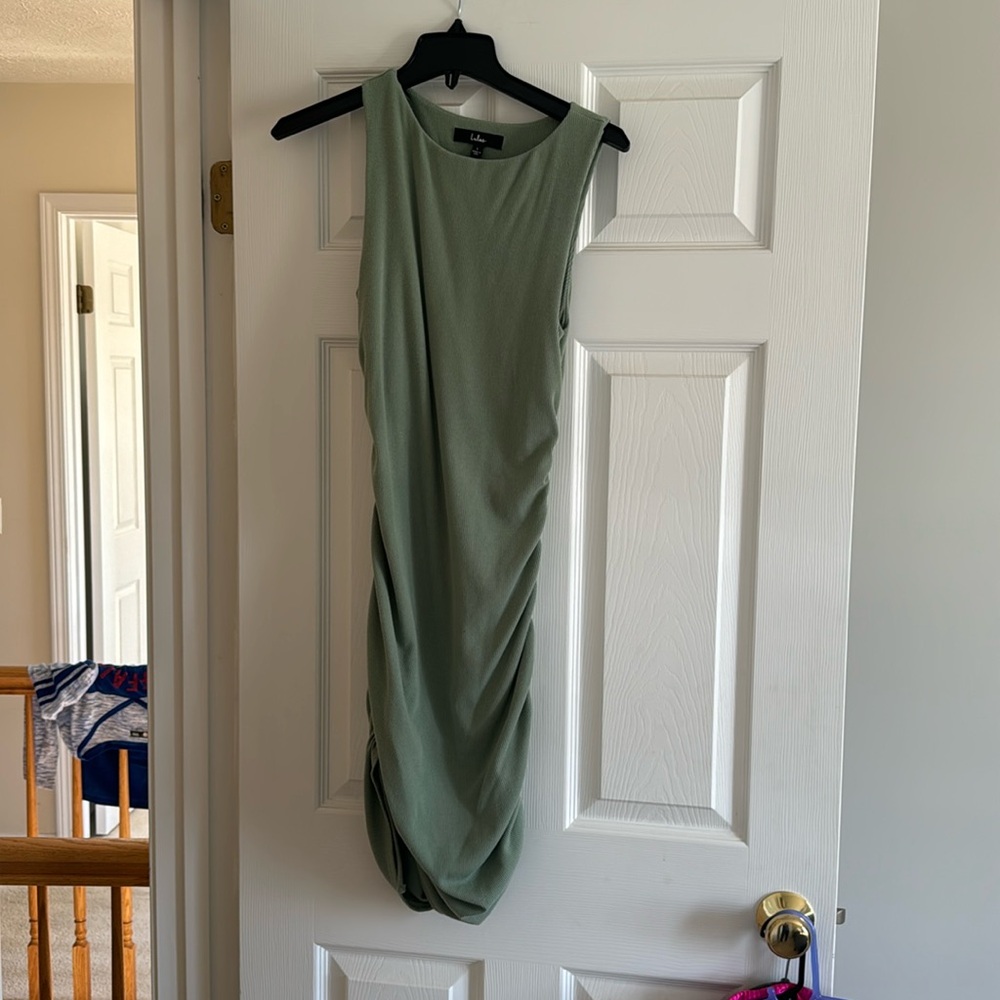 Green form fitting scrunched dress